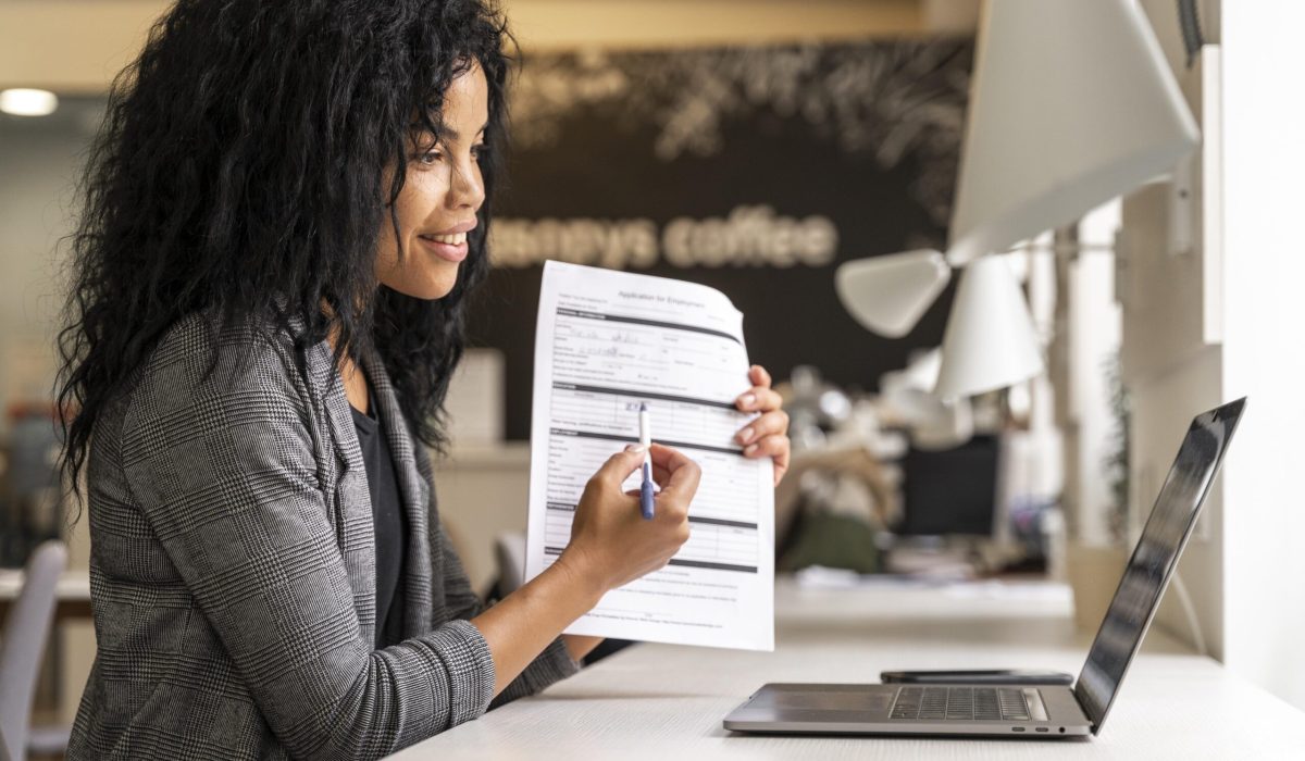 medium-shot-woman-showing-contract